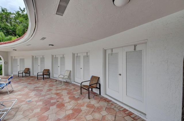 view of patio featuring french doors