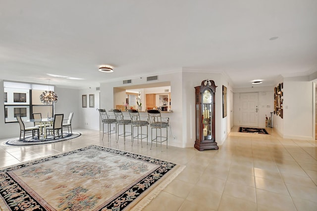 tiled living room with ornamental molding