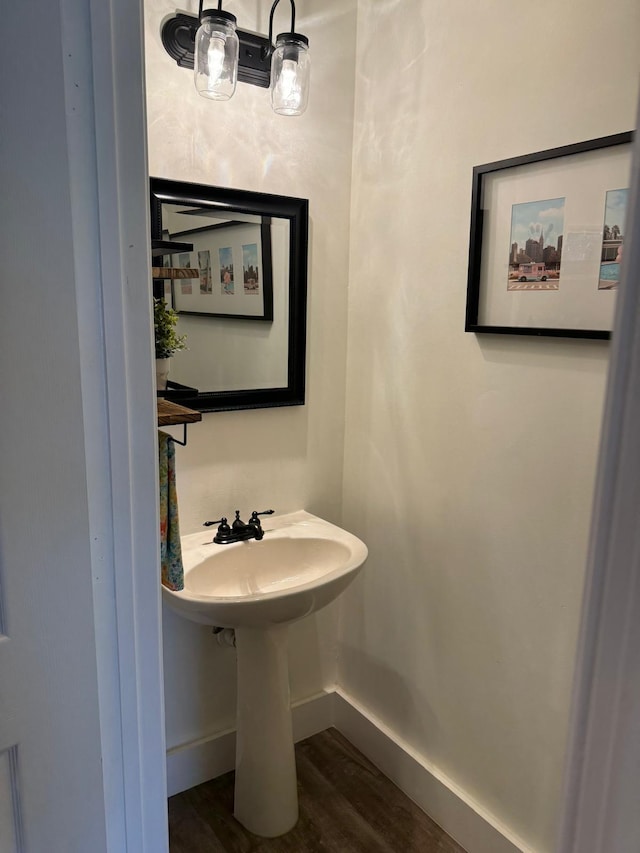 bathroom featuring hardwood / wood-style flooring