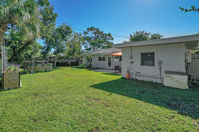 view of yard with a patio area