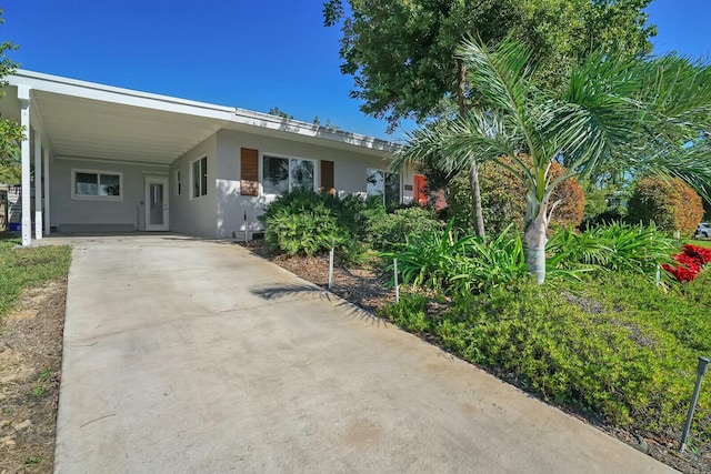 view of front of house with a carport