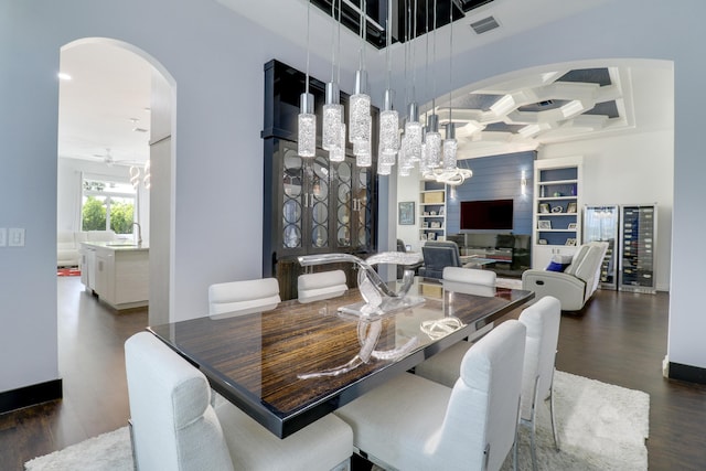 dining space featuring beamed ceiling, sink, wine cooler, dark hardwood / wood-style flooring, and coffered ceiling