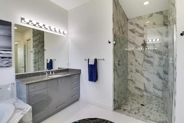 bathroom featuring plus walk in shower and vanity