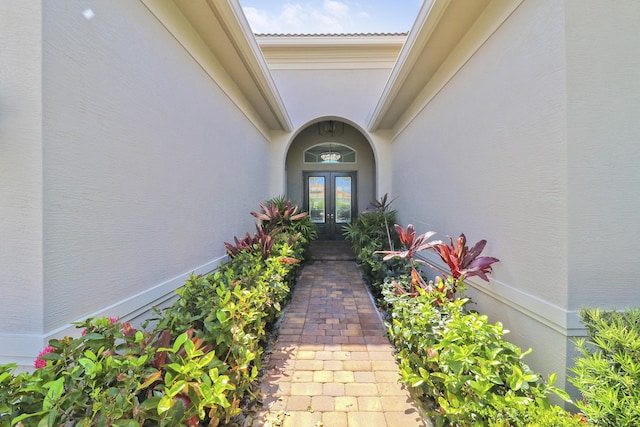 property entrance featuring french doors