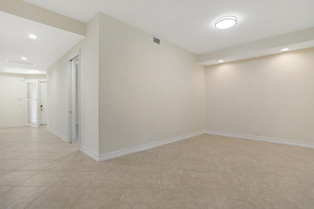 7575 Orchid Hammock Dr, West Palm Beach, FL 33412 - empty room featuring light tile patterned floors, recessed lighting, and baseboards