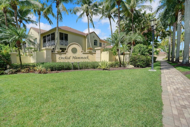 7575 Orchid Hammock Dr, West Palm Beach, FL 33412 - community / neighborhood sign with a lawn