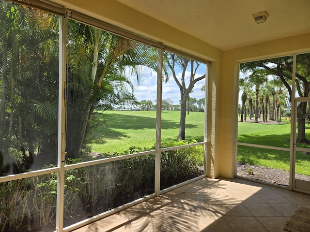 7575 Orchid Hammock Dr, West Palm Beach, FL 33412 - unfurnished sunroom with view of golf course