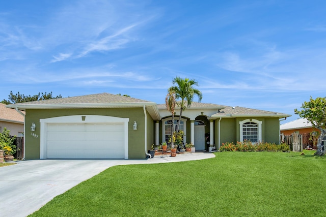 single story home with a garage and a front yard