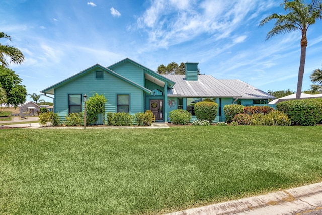 ranch-style home with a front lawn