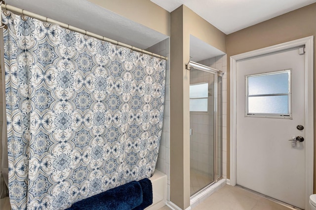 bathroom featuring a tile shower