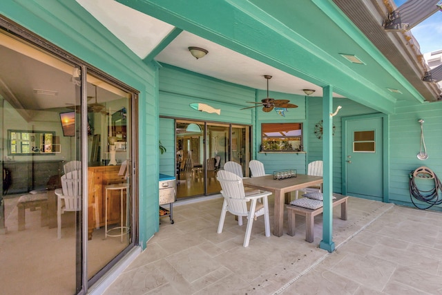 view of patio featuring ceiling fan