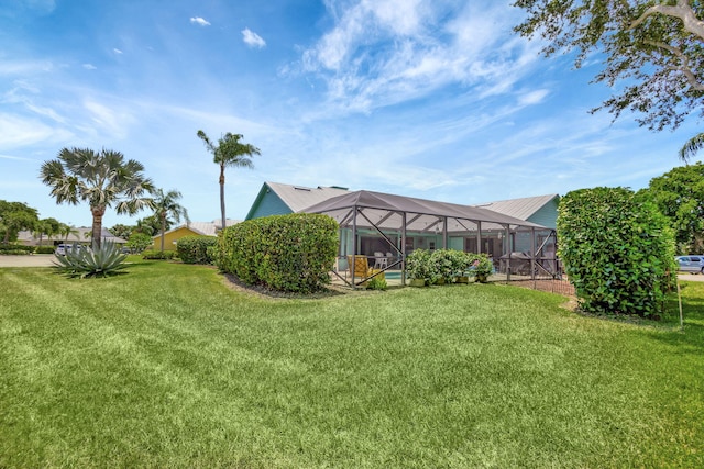 view of yard featuring a lanai