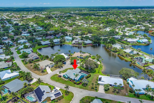 drone / aerial view with a water view