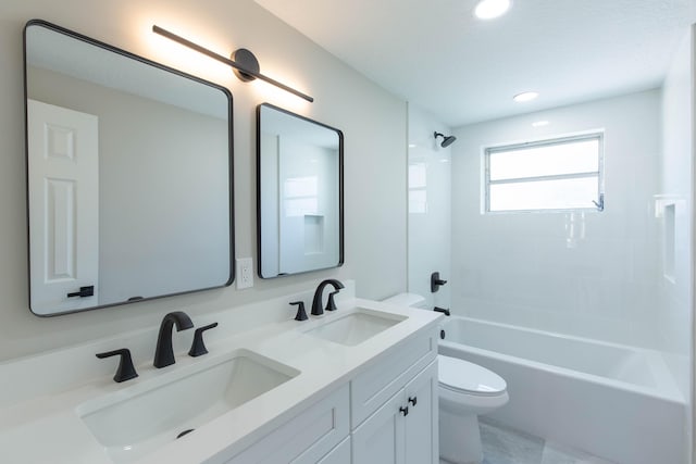 full bathroom featuring vanity, toilet, and shower / washtub combination