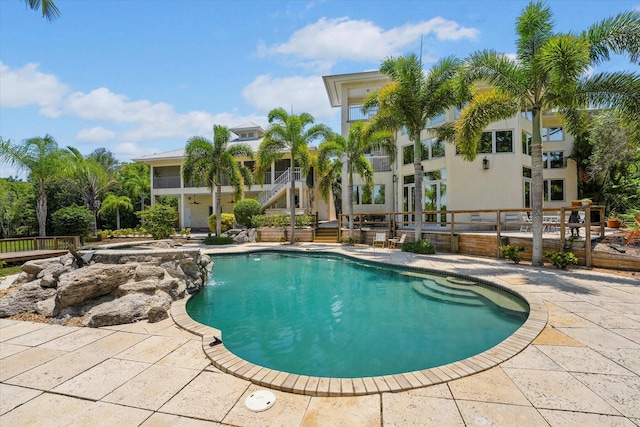 view of pool featuring a patio area