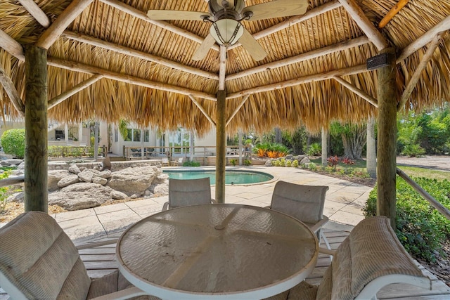 view of patio / terrace with a gazebo and ceiling fan