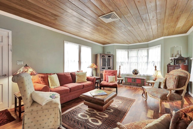 living room with hardwood / wood-style floors, crown molding, and wood ceiling