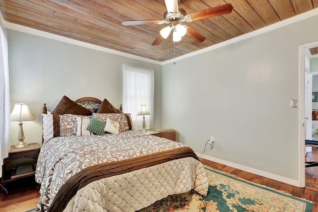 bedroom with hardwood / wood-style floors, ceiling fan, crown molding, and wood ceiling