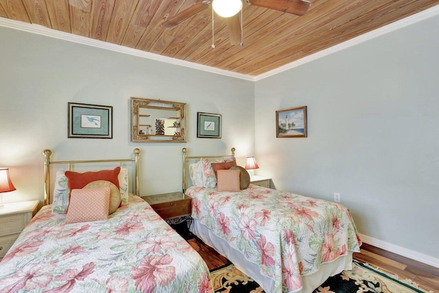 bedroom featuring ceiling fan, crown molding, wood ceiling, and hardwood / wood-style flooring