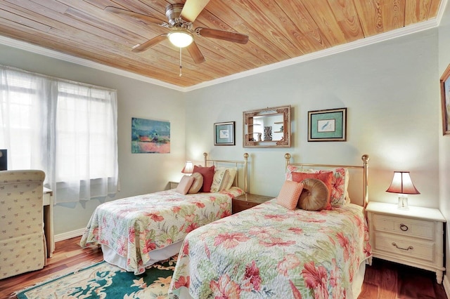 bedroom with ceiling fan, crown molding, and hardwood / wood-style flooring