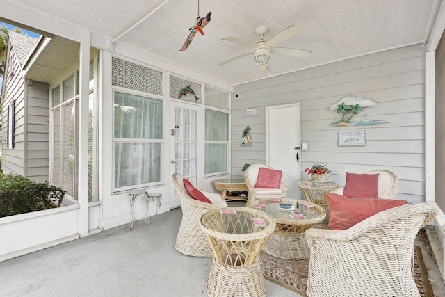 sunroom / solarium with ceiling fan