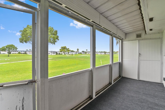 unfurnished sunroom with plenty of natural light