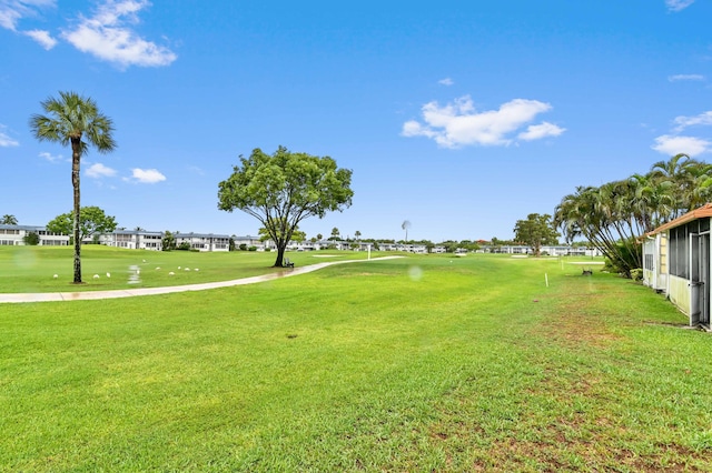 view of community with a lawn