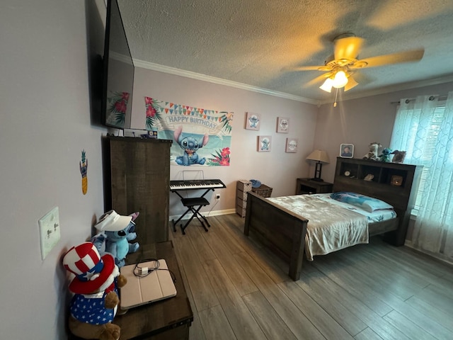 bedroom with crown molding, a textured ceiling, wood-type flooring, and ceiling fan