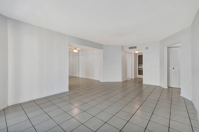 view of tiled spare room