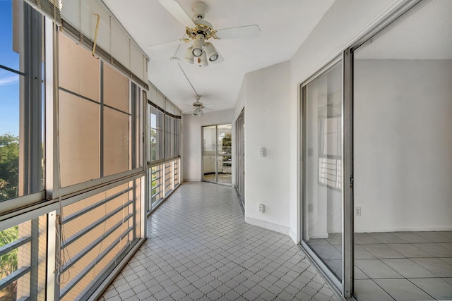 corridor featuring tile patterned floors