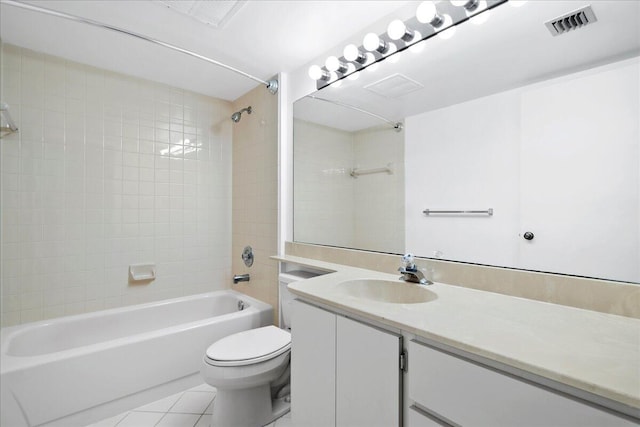 bathroom featuring visible vents, toilet, tile patterned flooring, tub / shower combination, and vanity