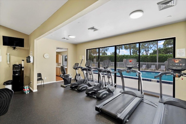 workout area featuring visible vents and baseboards