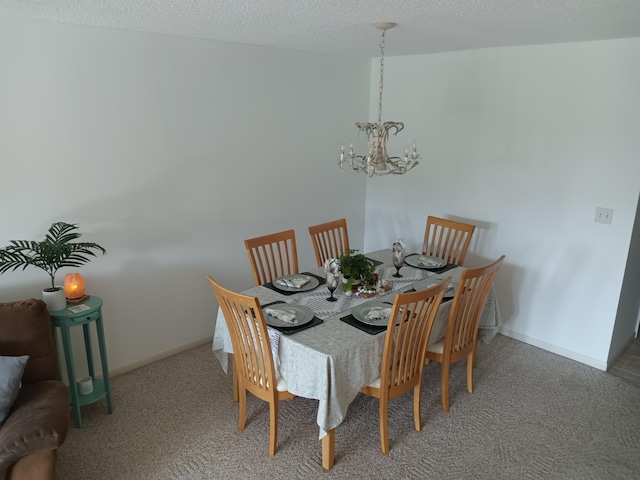 carpeted dining area with an inviting chandelier