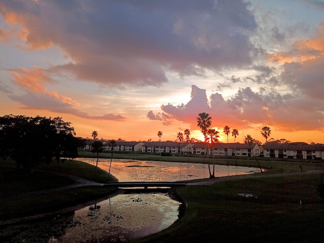 view of home's community with a water view