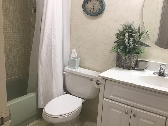 full bathroom featuring shower / bath combination with curtain, toilet, and vanity