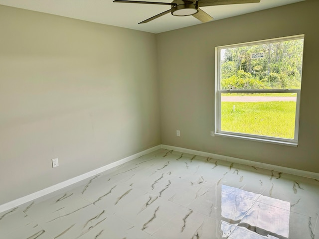 kitchen with gray cabinetry and light stone countertops