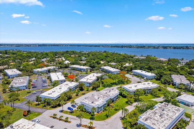 drone / aerial view with a water view