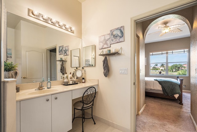 bathroom featuring ceiling fan and vanity