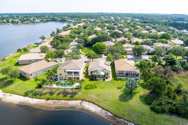 drone / aerial view with a water view