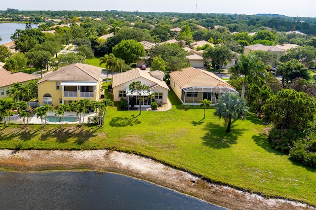 drone / aerial view with a water view