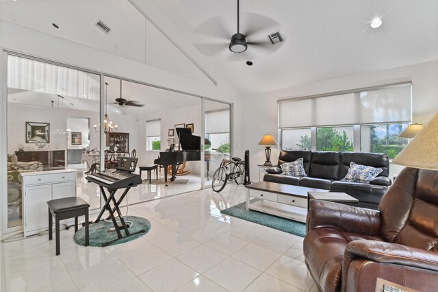 living room with ceiling fan and lofted ceiling