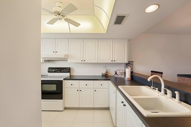 kitchen with light tile patterned flooring, sink, white cabinetry, electric range oven, and ceiling fan