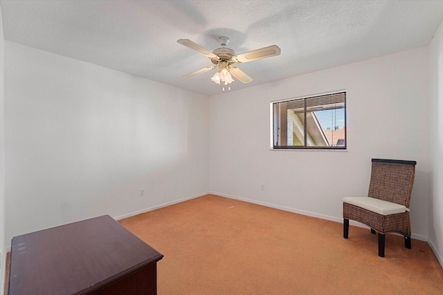 1600 NE Dixie Hwy Unit 10-205, Jensen Beach, FL 34957 - unfurnished room with light carpet, baseboards, ceiling fan, and a textured ceiling