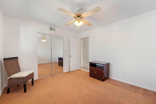 1600 NE Dixie Hwy Unit 10-205, Jensen Beach, FL 34957 - unfurnished room with light carpet, ceiling fan, and baseboards