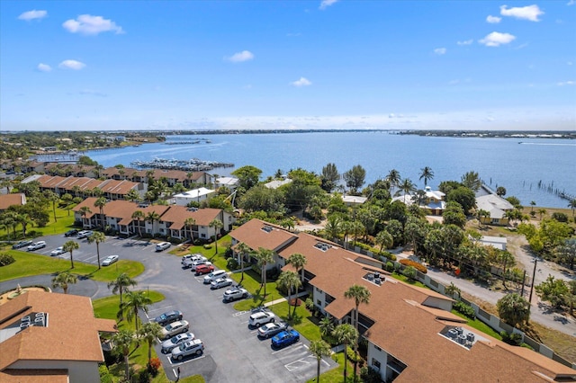 birds eye view of property featuring a water view