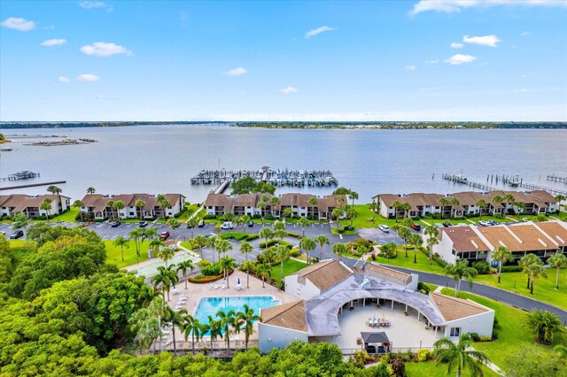 1600 NE Dixie Hwy Unit 10-205, Jensen Beach, FL 34957 - aerial view of a nearby body of water and a pool area