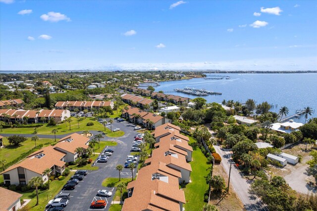 1600 NE Dixie Hwy Unit 10-205, Jensen Beach, FL 34957 - aerial perspective of suburban area featuring a large body of water