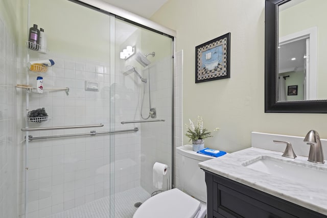 bathroom featuring walk in shower, vanity, and toilet