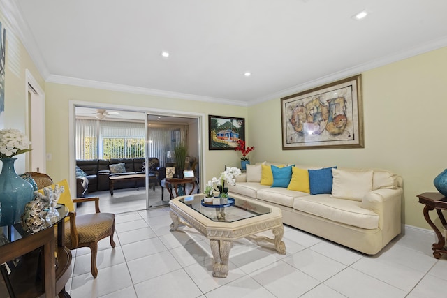 living room with ceiling fan, light tile patterned flooring, and ornamental molding