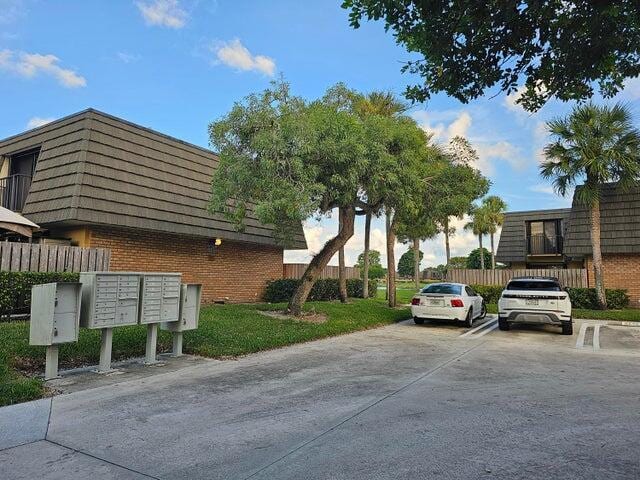 view of property's community with mail boxes